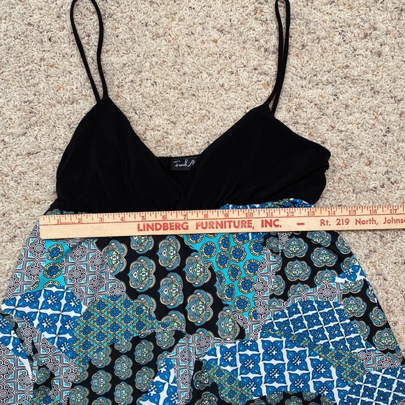 Sold as a set. Womens tops. Not sure of the sizes, but can get any measurements. - Picture 11 of 15